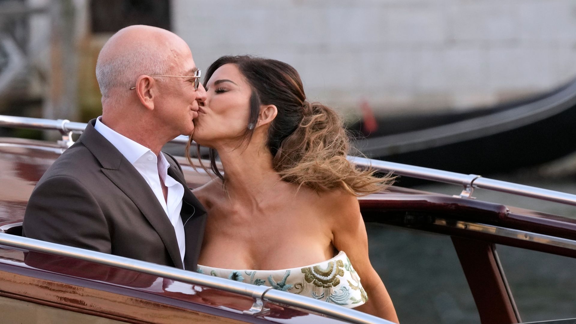 Lauren Sanchez posts a photo of her wedding gown as she weds Jeff Bezos in Venice.
