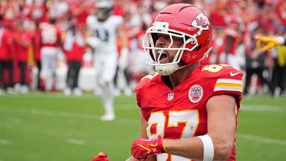 Travis Kelce of the Chiefs expresses his frustration by slamming his helmet after missing a key catch during the defeat to the Eagles.