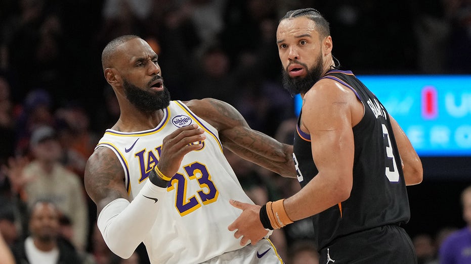 LeBron James tangles with Suns’ Dillon Brooks during Lakers’ narrow 2-point victory